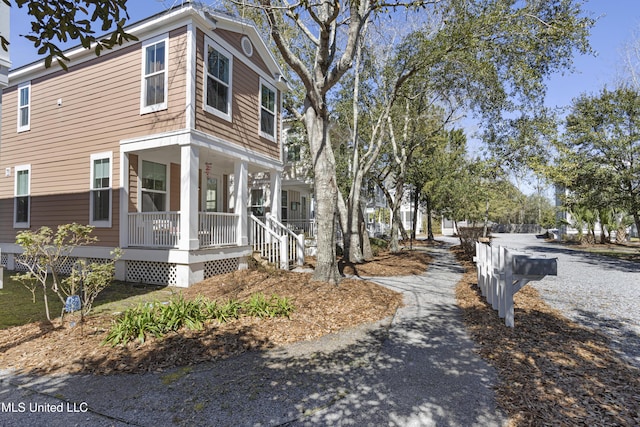 view of home's exterior featuring covered porch