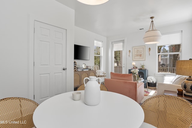 dining area featuring visible vents