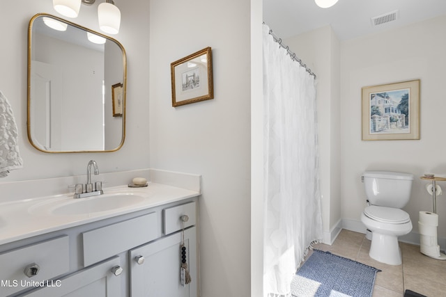 bathroom featuring visible vents, toilet, a shower with curtain, tile patterned floors, and vanity