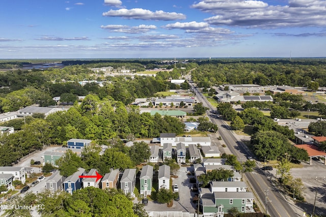 aerial view with a forest view and a residential view