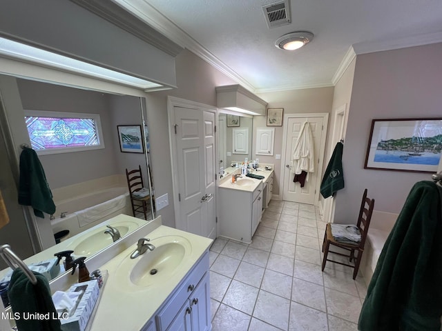 bathroom with vanity, ornamental molding, a tub, and tile patterned flooring