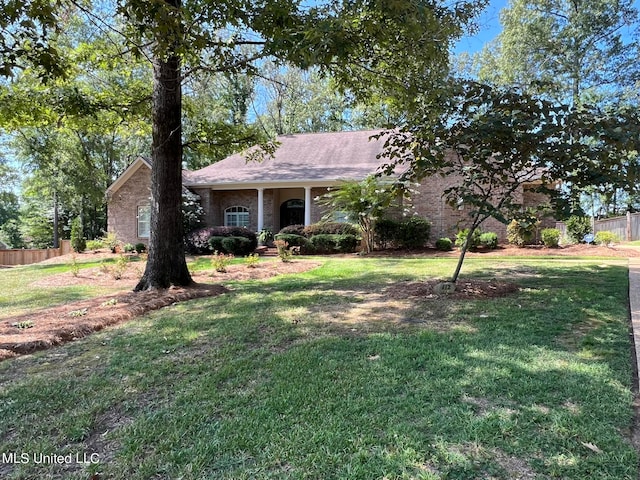 view of front of home with a front lawn