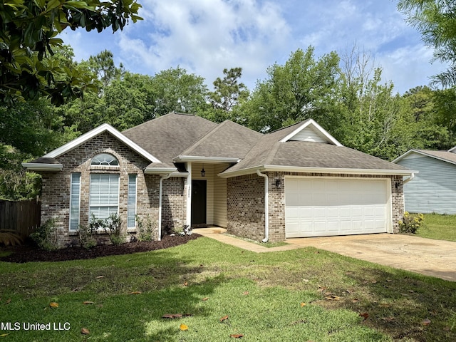 2505 Barbados Dr, Gautier, MS 39553 - ranch-style house featuring an attached garage, roof with shingles, brick siding, and concrete driveway