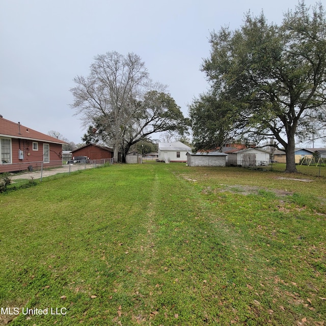 view of yard with fence