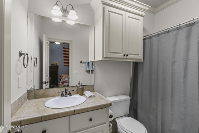 bathroom with toilet, crown molding, curtained shower, vanity, and a chandelier