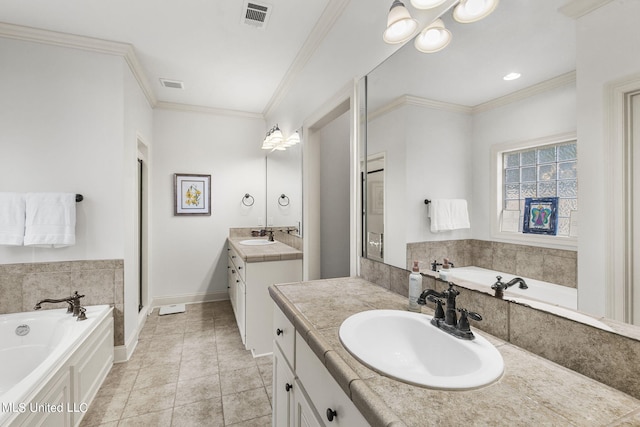 bathroom with vanity, crown molding, tile patterned floors, and tiled bath