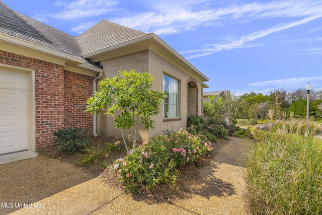 view of home's exterior featuring a garage