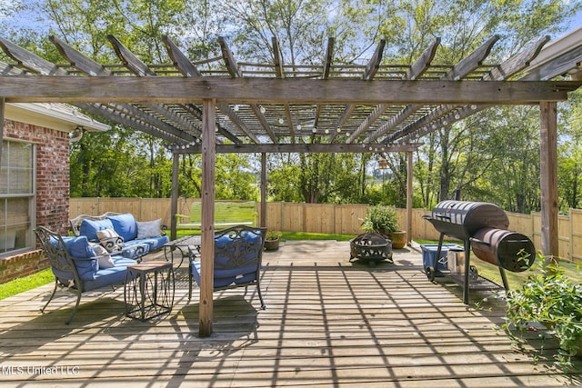 view of patio with an outdoor living space with a fire pit and a pergola