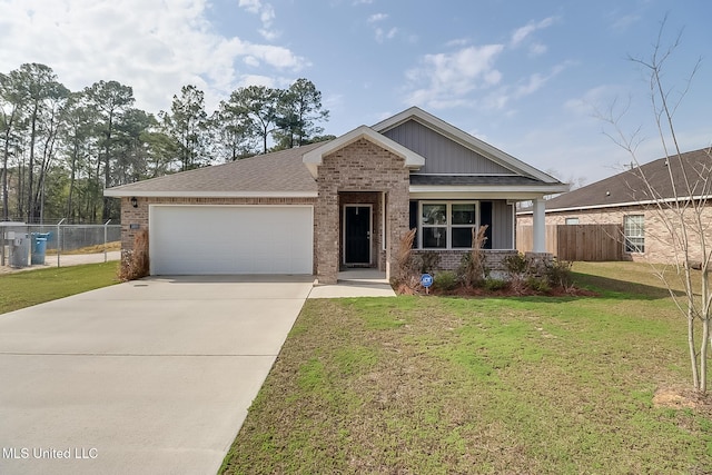 craftsman house with a garage and a front yard