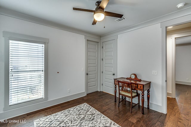 office space with ceiling fan and dark wood-type flooring