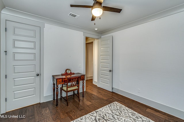 office space with ceiling fan, dark wood-type flooring, and crown molding