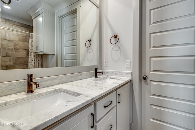 bathroom featuring vanity