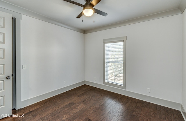 unfurnished room with ceiling fan and dark hardwood / wood-style floors