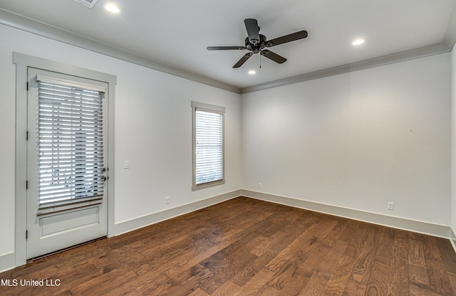 unfurnished room with dark wood-type flooring, crown molding, and ceiling fan