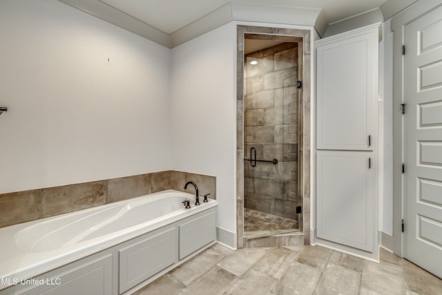 bathroom with independent shower and bath