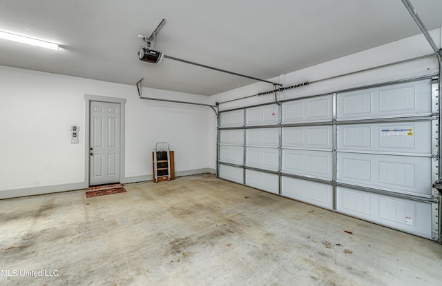 garage featuring a garage door opener