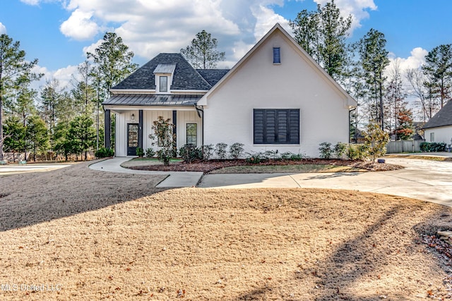 view of front of house featuring covered porch