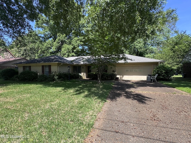 ranch-style home with asphalt driveway, an attached garage, a front yard, and brick siding