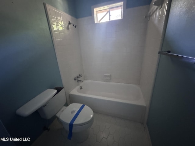 full bathroom with toilet, tile patterned floors, and bathtub / shower combination