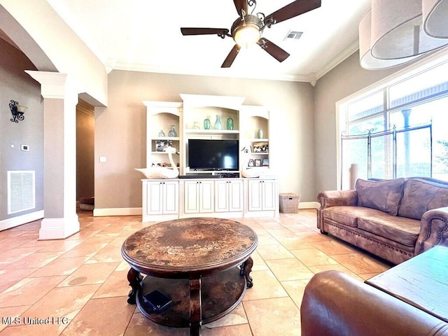 6 Lunker Ln, Poplarville, MS 39470 - living room featuring ceiling fan, ornamental molding, ornate columns, baseboards, and light tile patterned floors
