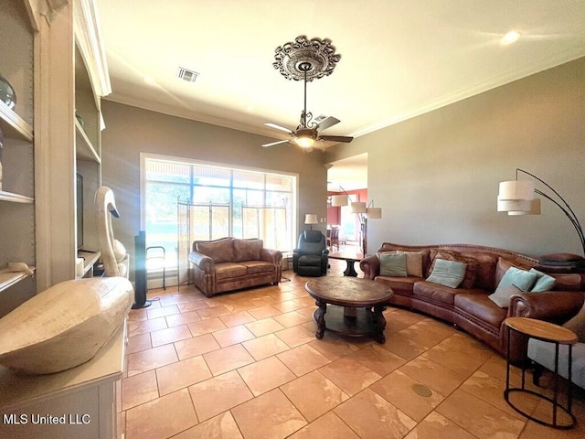 6 Lunker Ln, Poplarville, MS 39470 - living area with ornamental molding, ceiling fan, and light tile patterned flooring