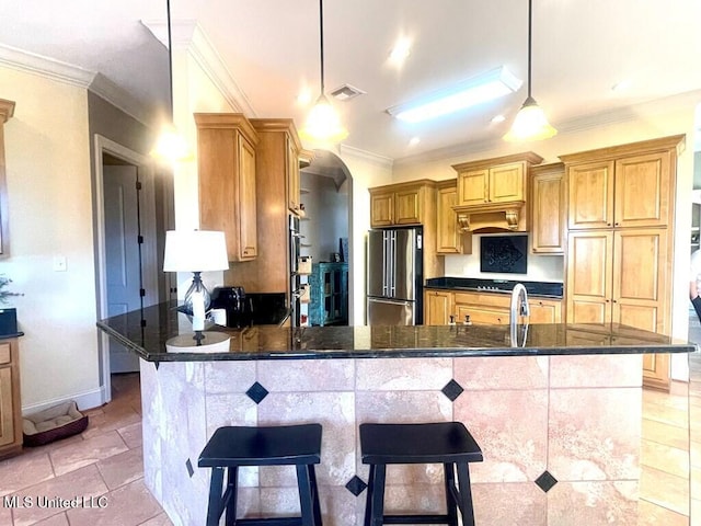 6 Lunker Ln, Poplarville, MS 39470 - kitchen with high end refrigerator, ornamental molding, dark countertops, arched walkways, and a peninsula