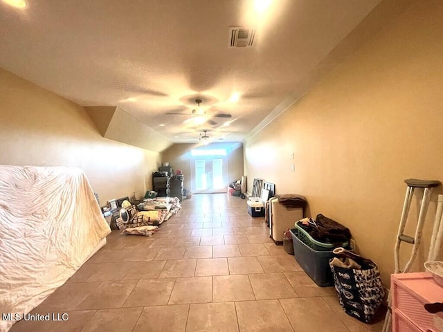 6 Lunker Ln, Poplarville, MS 39470 - additional living space with lofted ceiling, ceiling fan, and light tile patterned floors
