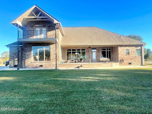 6 Lunker Ln, Poplarville, MS 39470 - rear view of property featuring a balcony, a yard, and brick siding