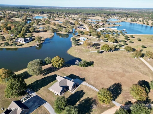 6 Lunker Ln, Poplarville, MS 39470 - aerial view of property and surrounding area featuring a nearby body of water