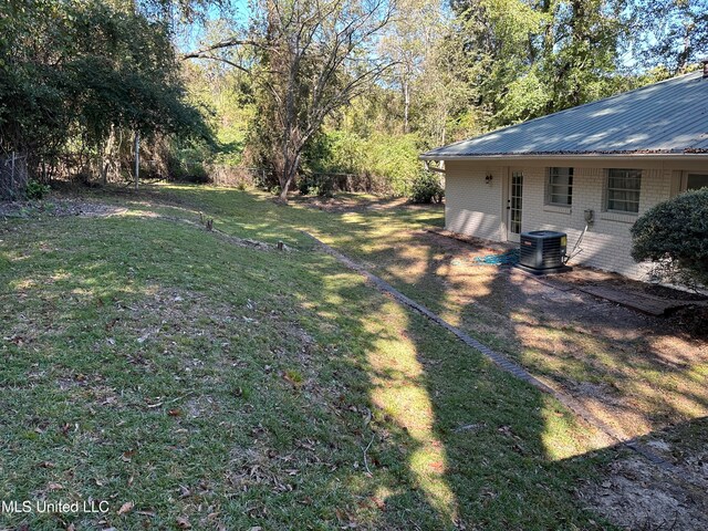 view of yard featuring cooling unit