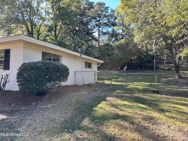 view of property exterior featuring a lawn