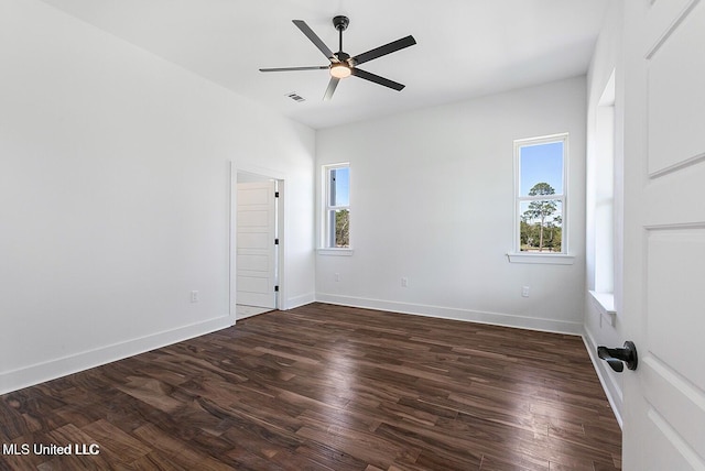225 Magnolia Ave, Pass Christian, MS 39571 - unfurnished room with a ceiling fan and dark wood-type flooring