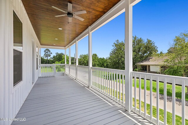 225 Magnolia Ave, Pass Christian, MS 39571 - wooden terrace with ceiling fan