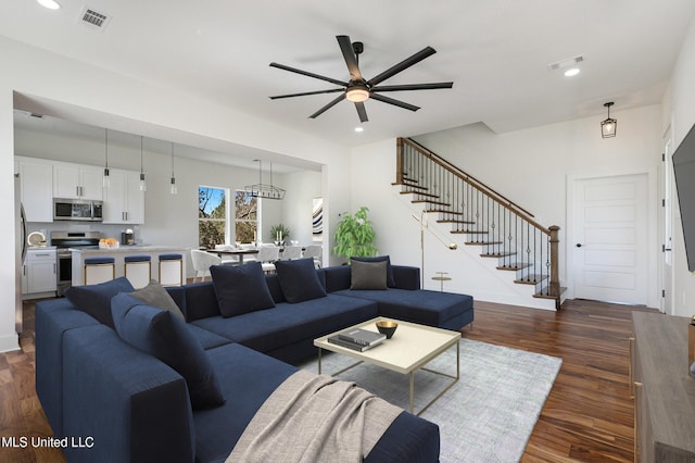 225 Magnolia Ave, Pass Christian, MS 39571 - living room with ceiling fan, stairs, dark wood-type flooring, and recessed lighting