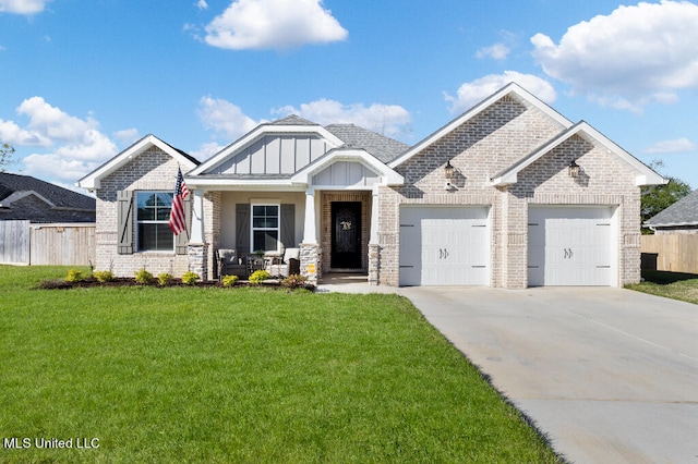 craftsman-style house featuring a front lawn and a garage