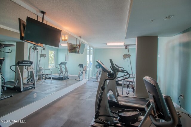 2060 Beach Blvd Unit 307, Biloxi, MS 39531 - gym featuring a textured ceiling