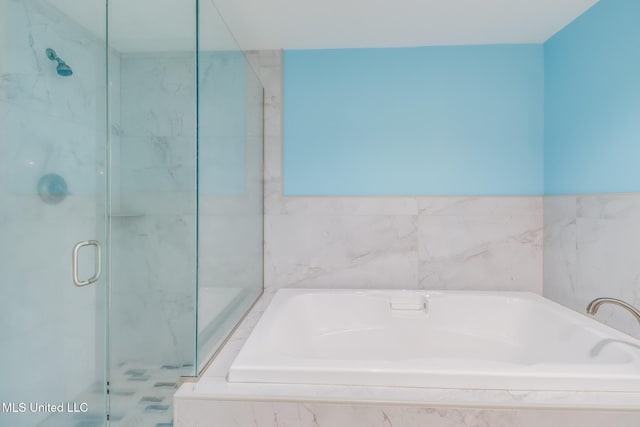 2060 Beach Blvd Unit 307, Biloxi, MS 39531 - full bath featuring a garden tub and a stall shower