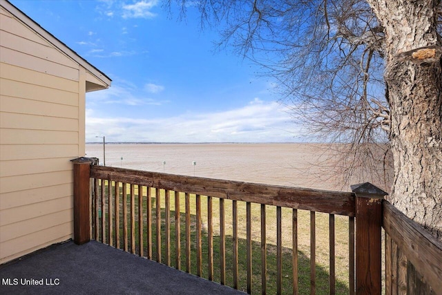 deck featuring a water view