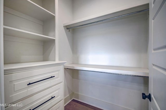 251 Westlake Cir, Madison, MS 39110 - spacious closet featuring dark wood-type flooring