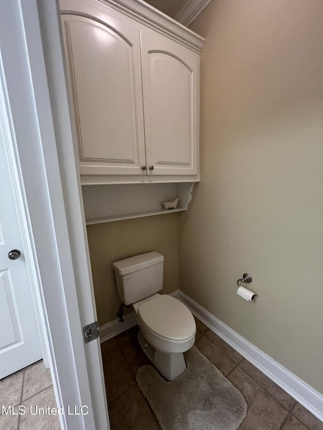 308 Barrington Cv, Byram, MS 39272 - bathroom featuring toilet, tile patterned floors, and baseboards