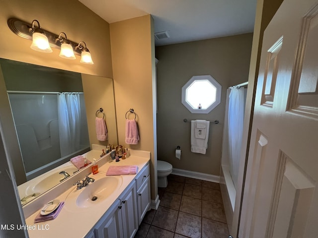 308 Barrington Cv, Byram, MS 39272 - full bath with vanity, toilet, tile patterned floors, shower / bath combo, and baseboards