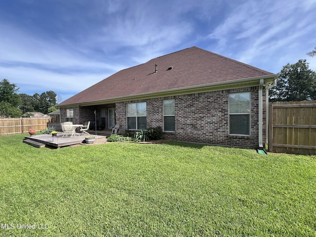 308 Barrington Cv, Byram, MS 39272 - back of house featuring a deck, brick siding, and roof with shingles