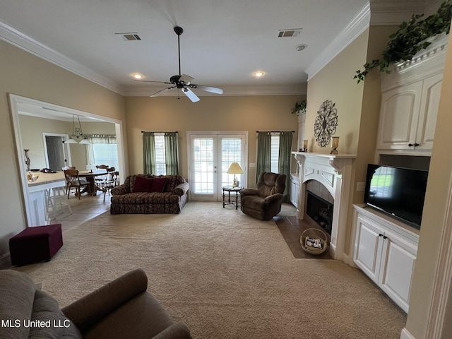 308 Barrington Cv, Byram, MS 39272 - living room with light colored carpet, a ceiling fan, crown molding, a fireplace with flush hearth, and recessed lighting