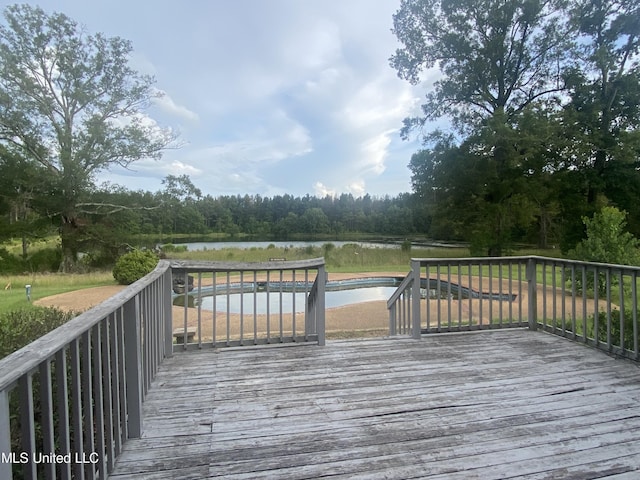 deck featuring a water view