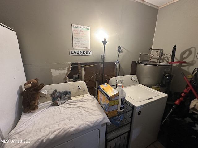 laundry area featuring water heater