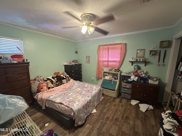 bedroom with crown molding, dark wood-type flooring, and a textured ceiling