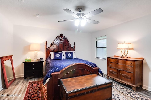 3109 Breezy Hill Ln, Ocean Springs, MS 39564 - bedroom featuring wood finished floors and baseboards