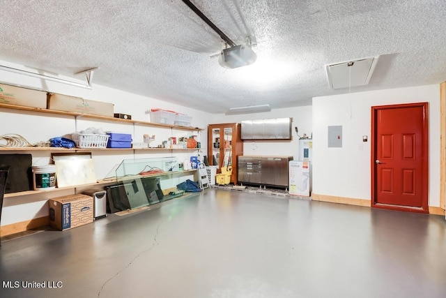 3109 Breezy Hill Ln, Ocean Springs, MS 39564 - garage with a garage door opener, electric panel, and baseboards