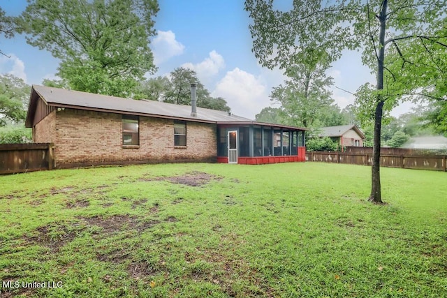3109 Breezy Hill Ln, Ocean Springs, MS 39564 - back of house featuring a sunroom and brick siding