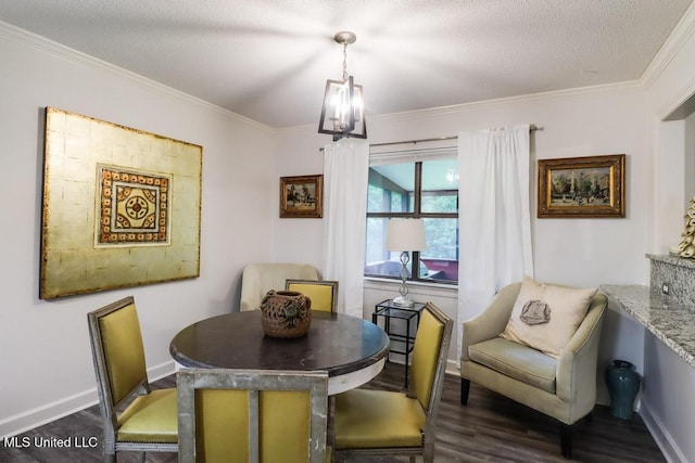 3109 Breezy Hill Ln, Ocean Springs, MS 39564 - dining room with dark wood-style flooring, crown molding, a chandelier, baseboards, and a textured ceiling